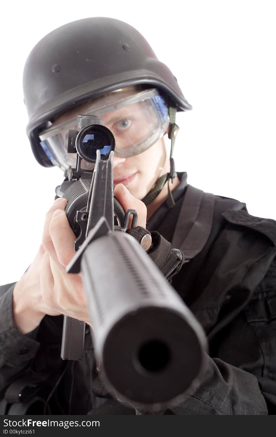 Shot of a soldier holding gun. Uniform conforms to special services(soldiers) of the NATO countries. Shot of a soldier holding gun. Uniform conforms to special services(soldiers) of the NATO countries.