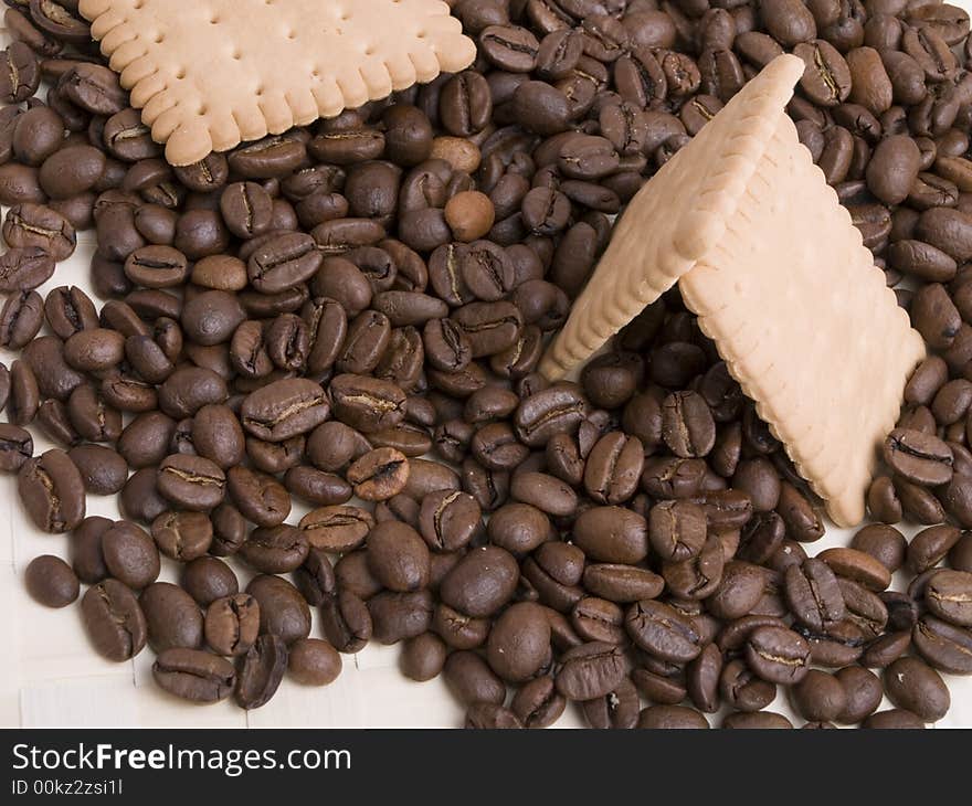 Coffee beans and biscuit