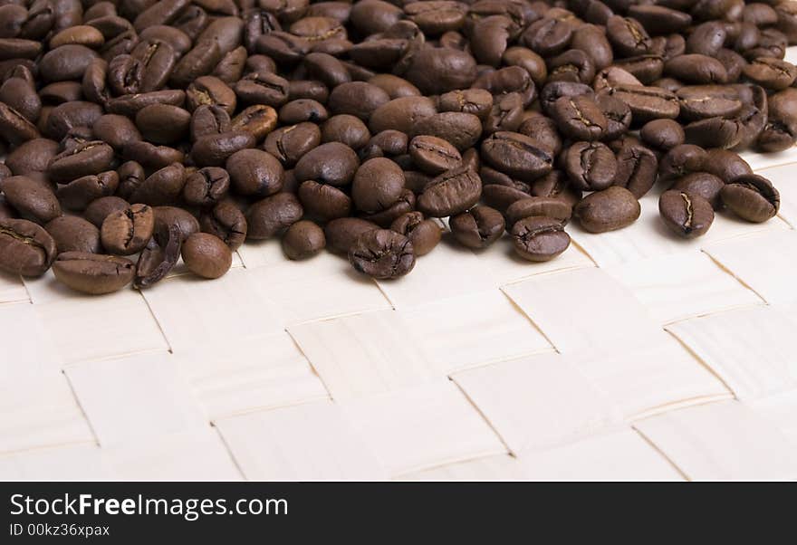 Coffee beans on the white background