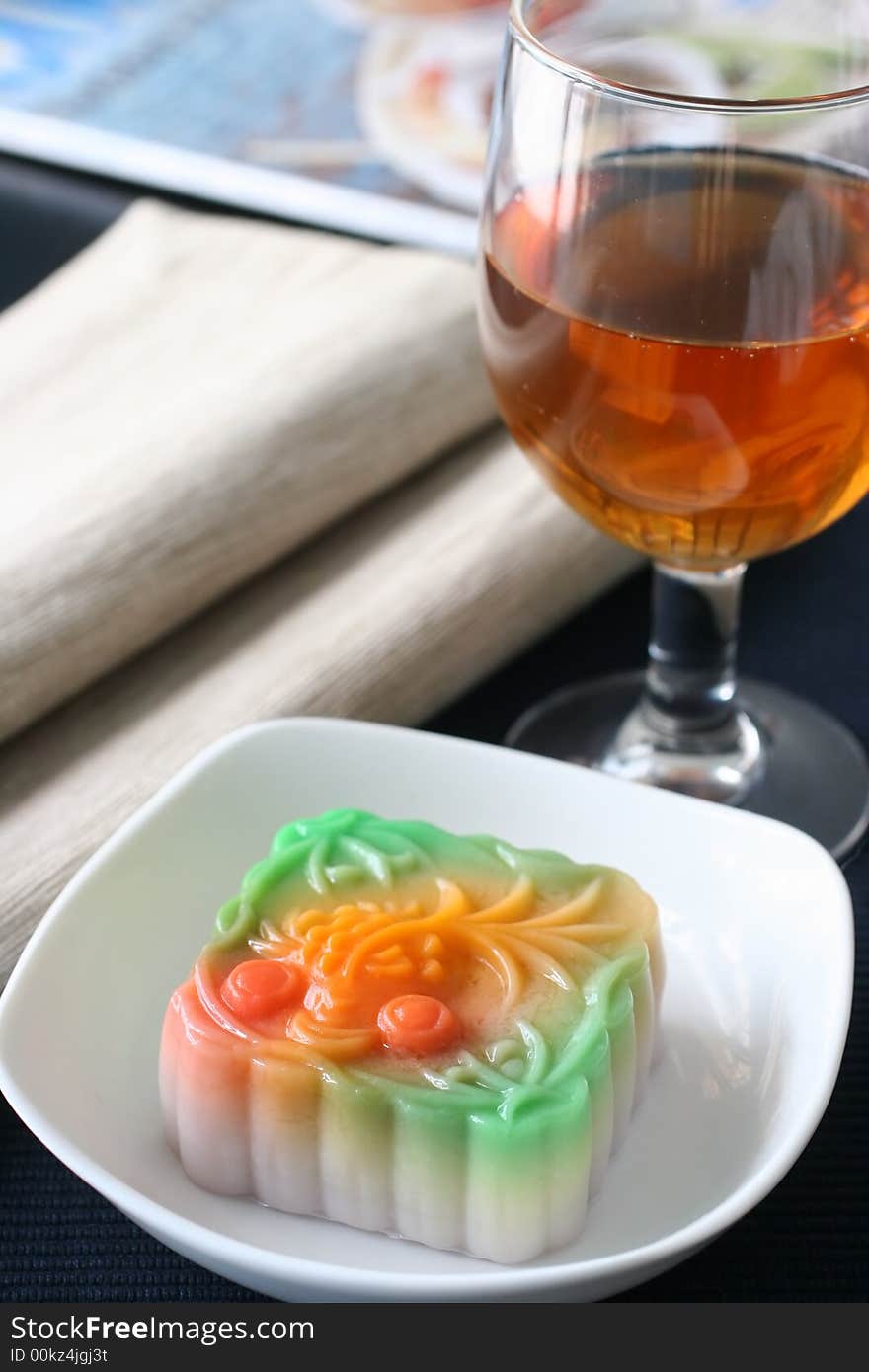 Colorful fruit flavored mooncakes with goldfish patterns signifying prosperity and wealth. Colorful fruit flavored mooncakes with goldfish patterns signifying prosperity and wealth