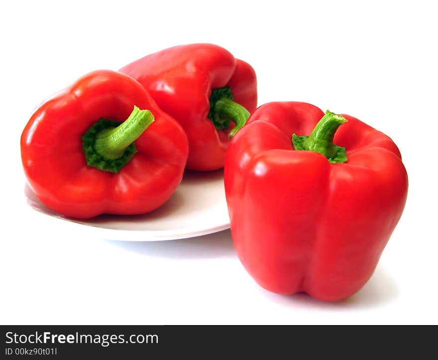 Red pepper on plate isolated