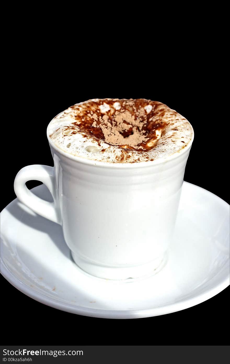 Cup of cappuccino with cream