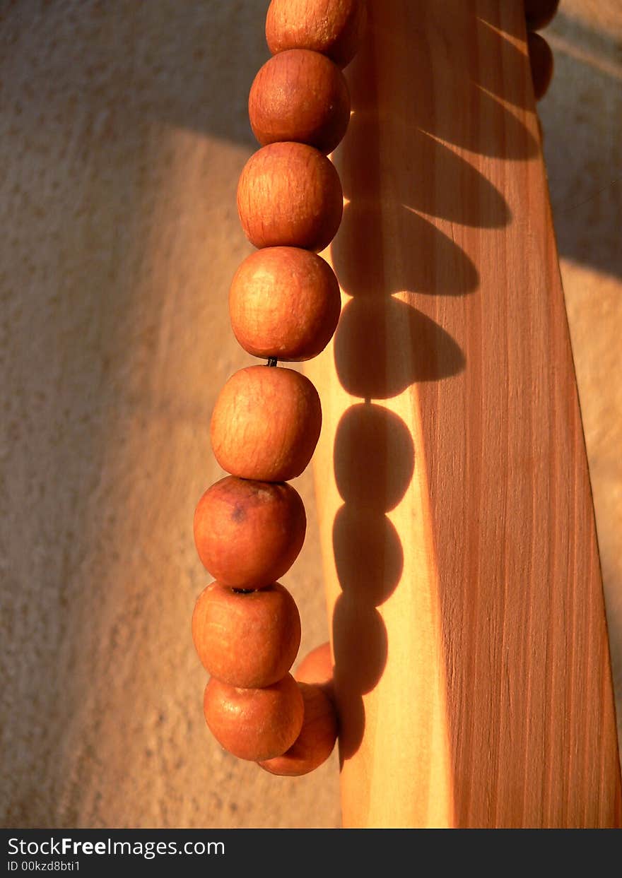 Wood beads in sun in room