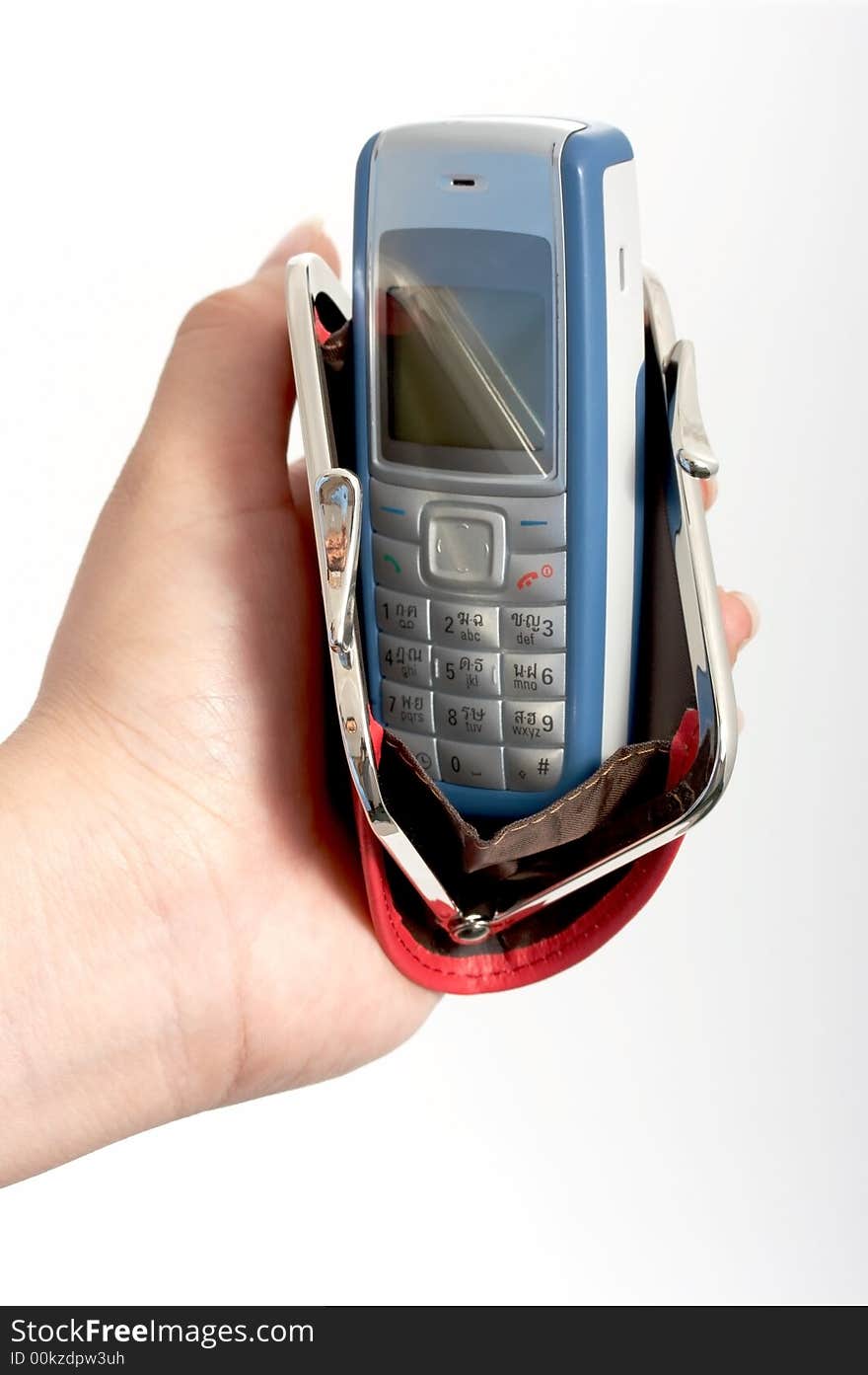 A hand holding a mobile phone over a white background