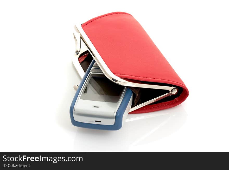 A mobile phone inside a red wallet over a white background. A mobile phone inside a red wallet over a white background