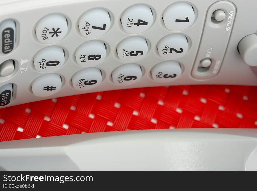 Photo of a telephone over a red background