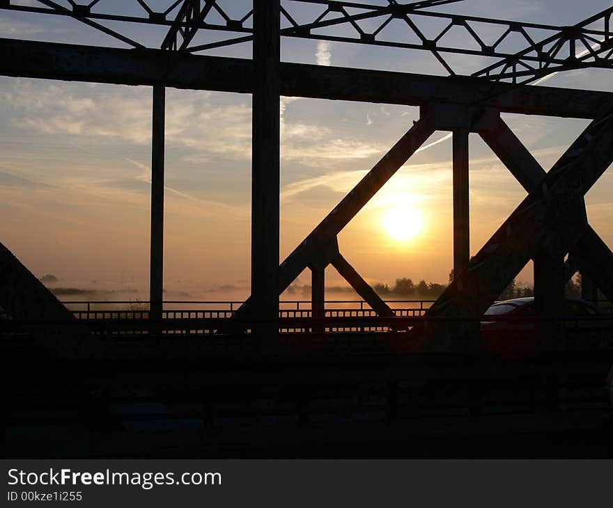 Bridge on Warta river in sun (Konin)