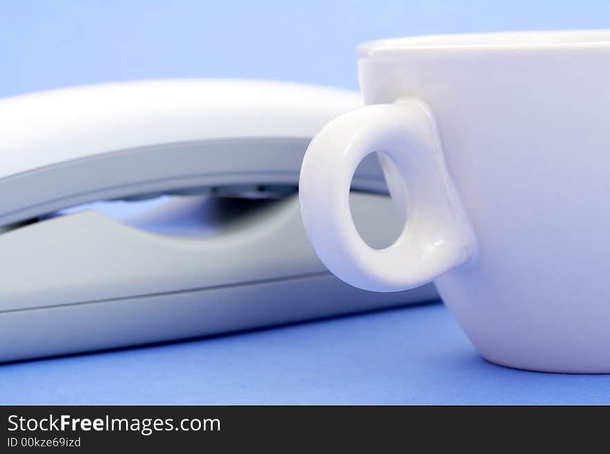 Photo of a telephone over a blue background