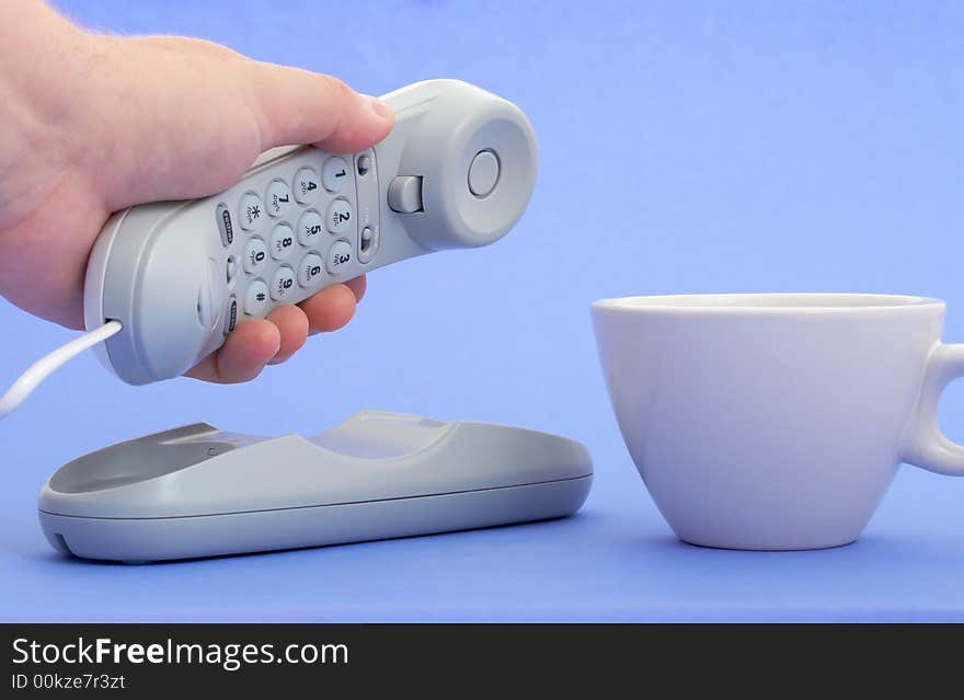 Photo of a telephone over a blue background