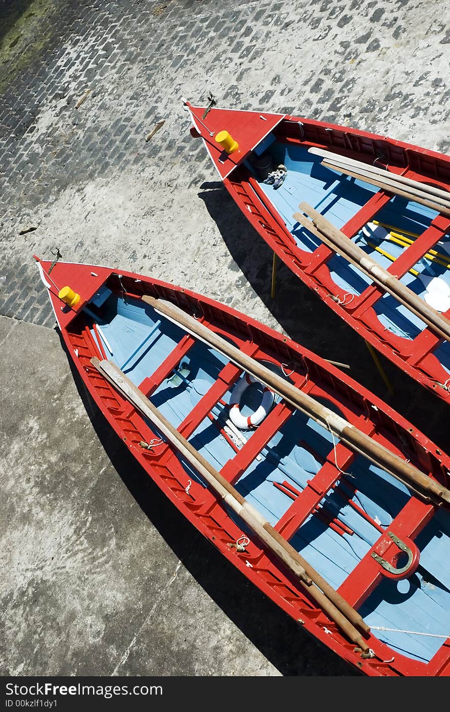 Long rowboats in beaching place