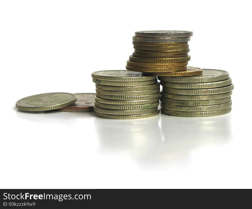 A pile of coins isolated on white background