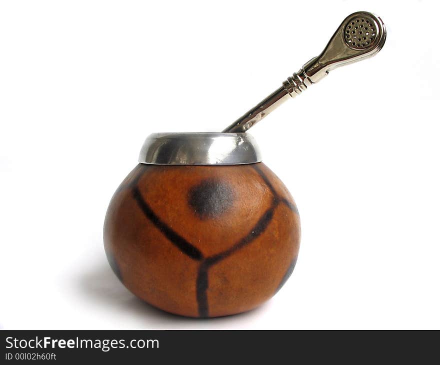 Сup from calabash with yerba mate tea and straw, traditional drink of Argentina