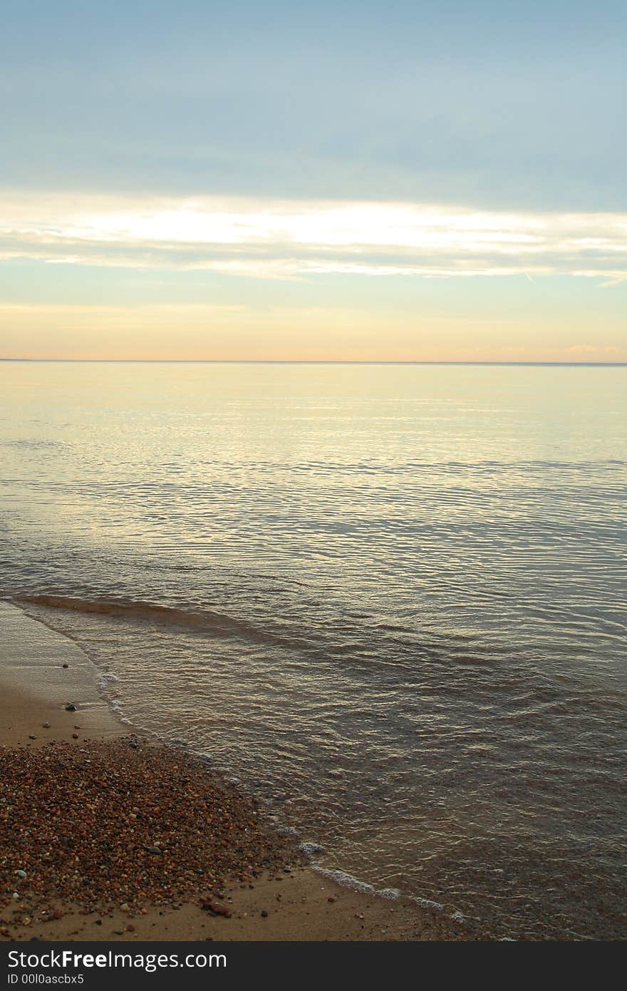 Serene sunset on the sea shore. Serene sunset on the sea shore