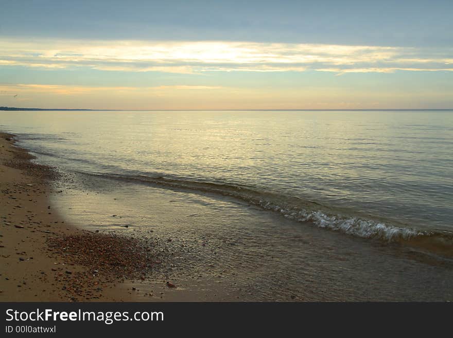 Serene sunset on the sea shore. Serene sunset on the sea shore