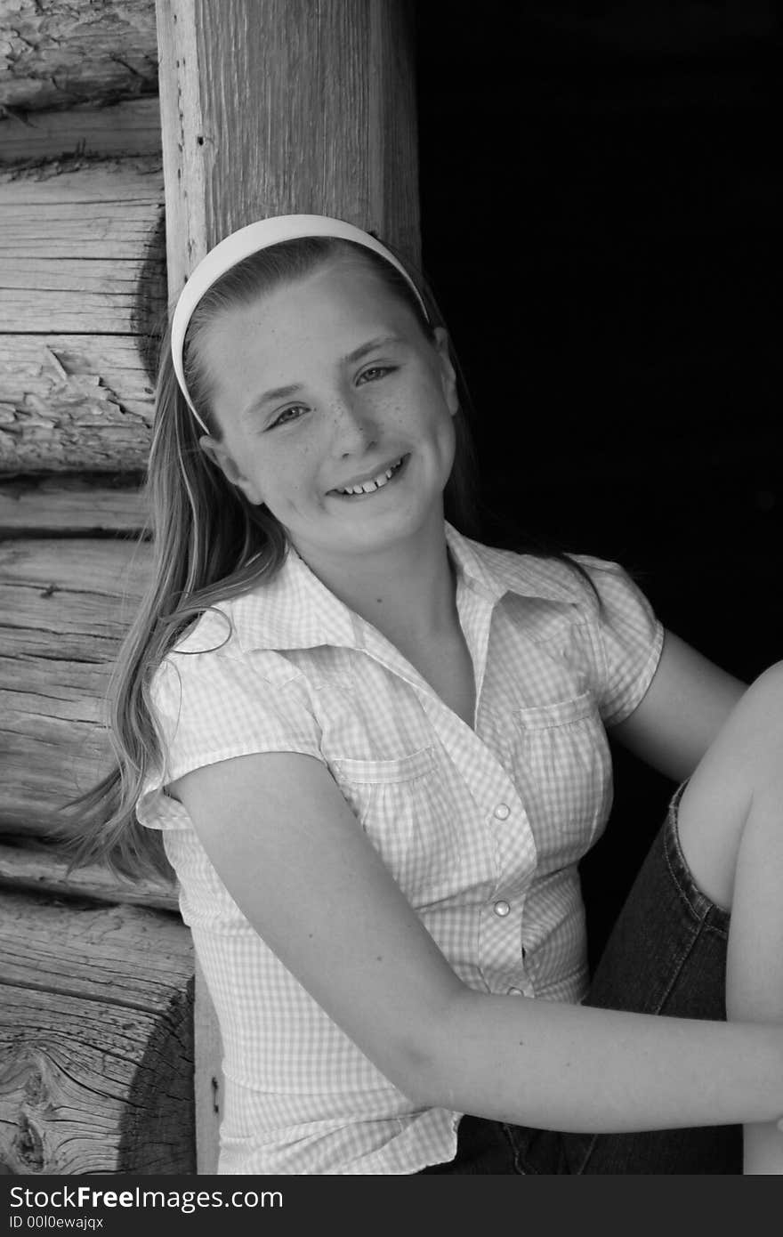 Black and white of a teen smiling. Black and white of a teen smiling