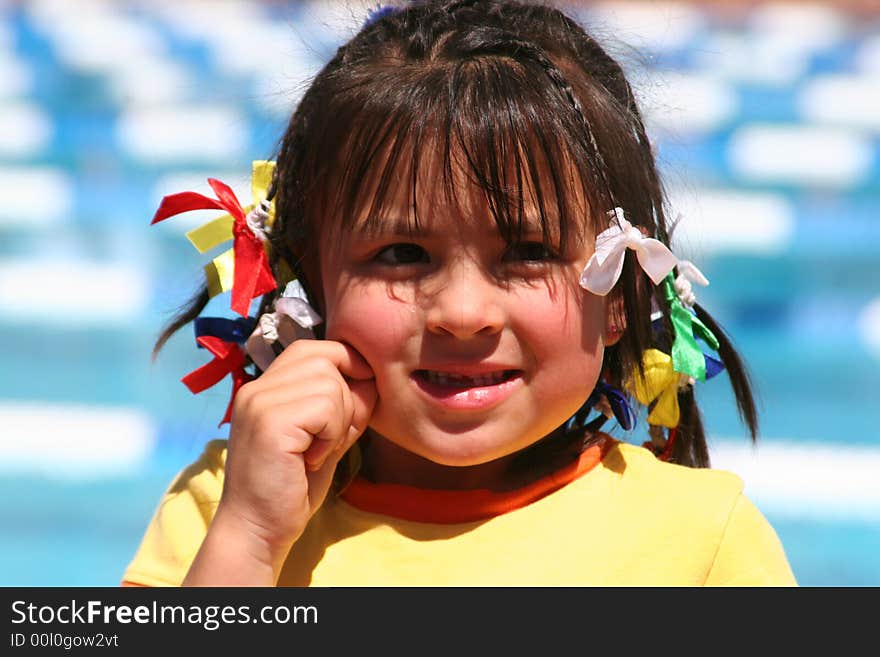 Smiling girl at the pool