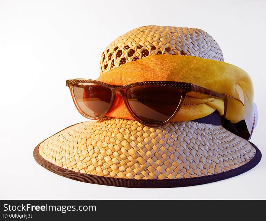 Straw hat and sunglasses; working path. Straw hat and sunglasses; working path.