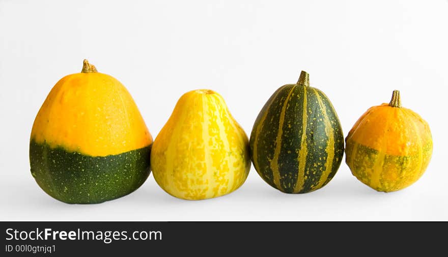 Four decorative pumpkins