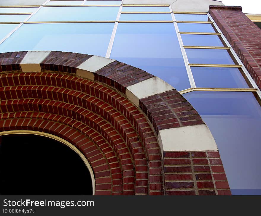 Shot of a brick building and lots of windows looking up. Shot of a brick building and lots of windows looking up.