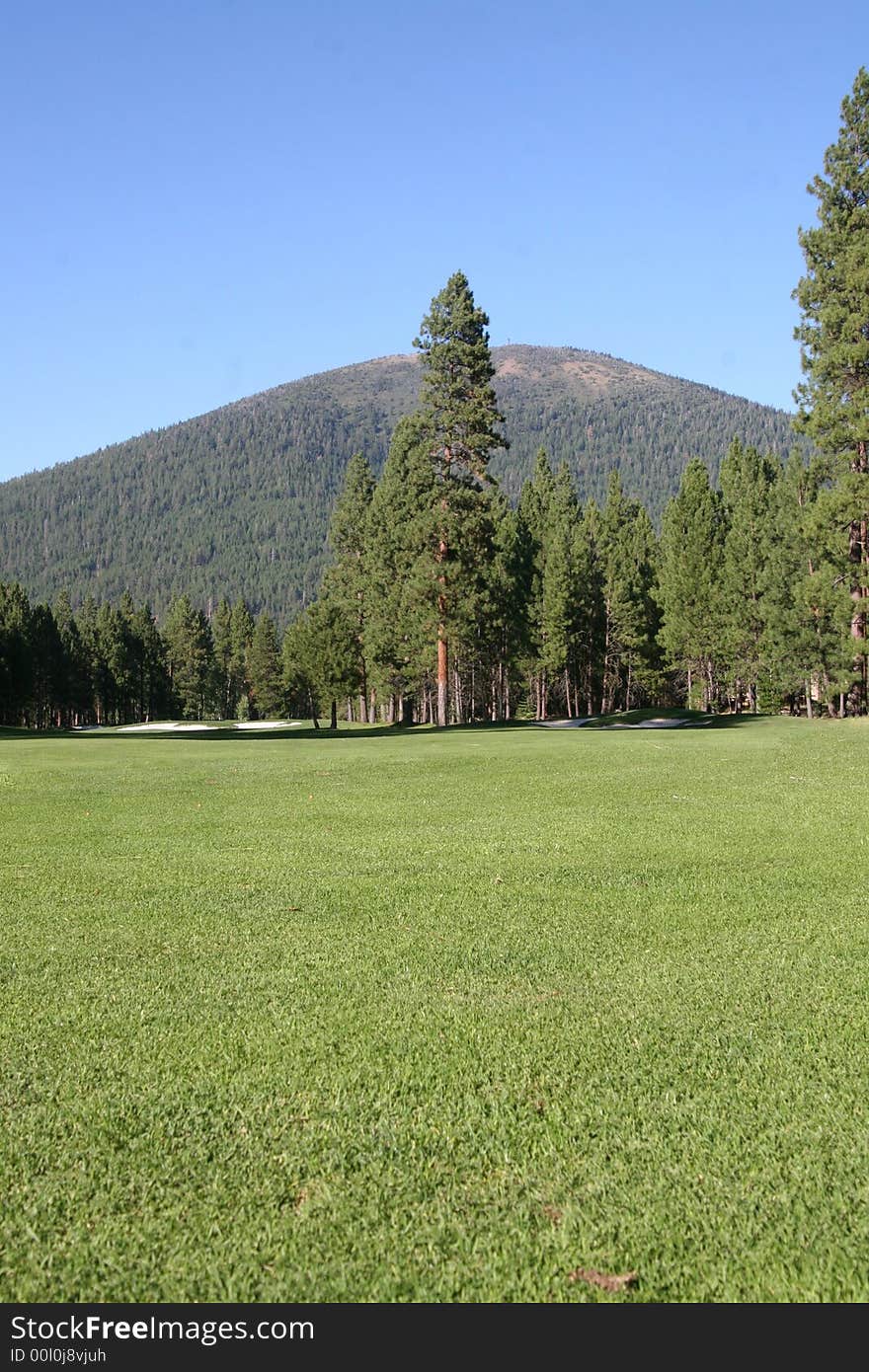 golf course and butte sunny day