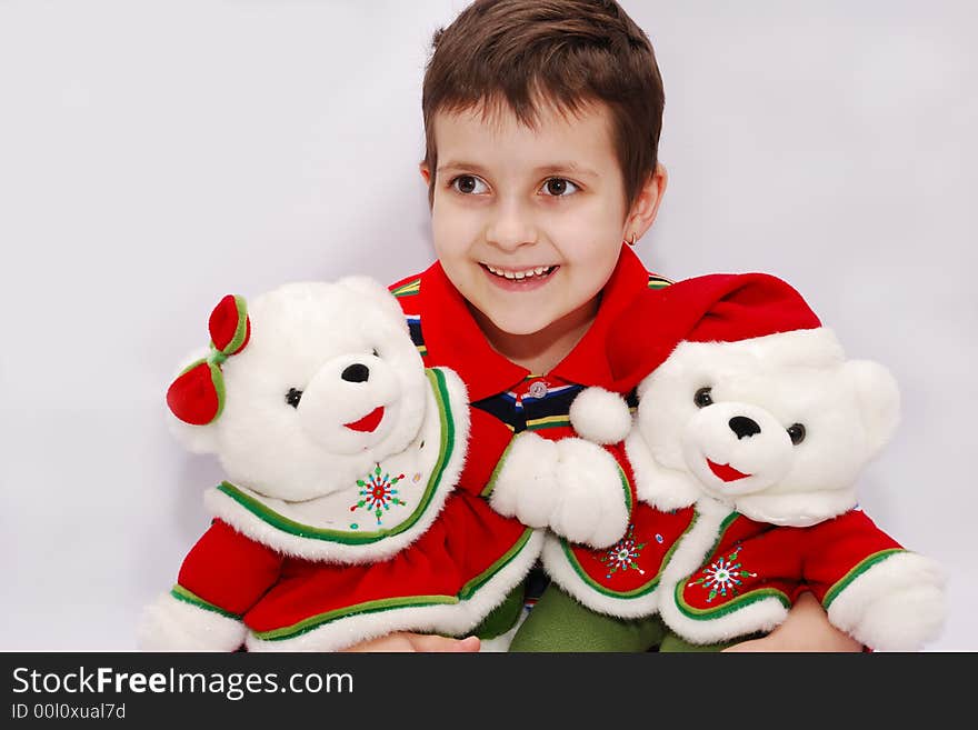 Funny child with christmas bears