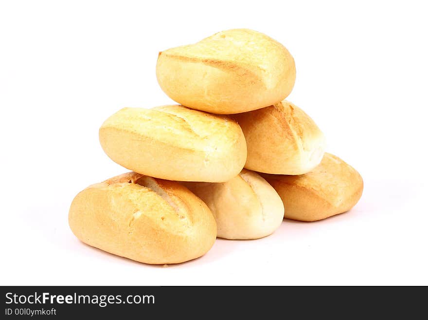 A breakfast tray with fresh bread and roll