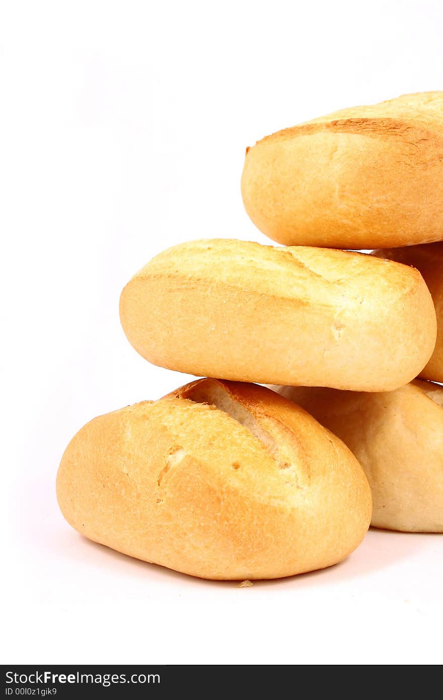 A breakfast tray with fresh bread and roll