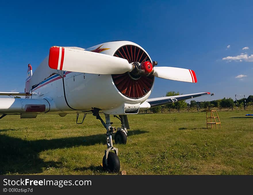 Small sport airplane on land