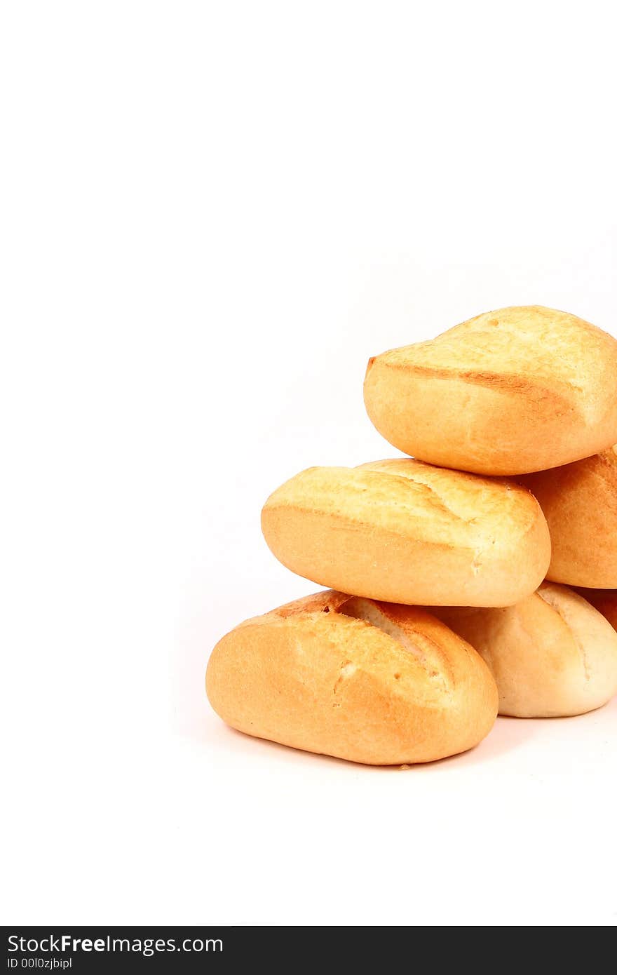 A breakfast tray with fresh bread and roll