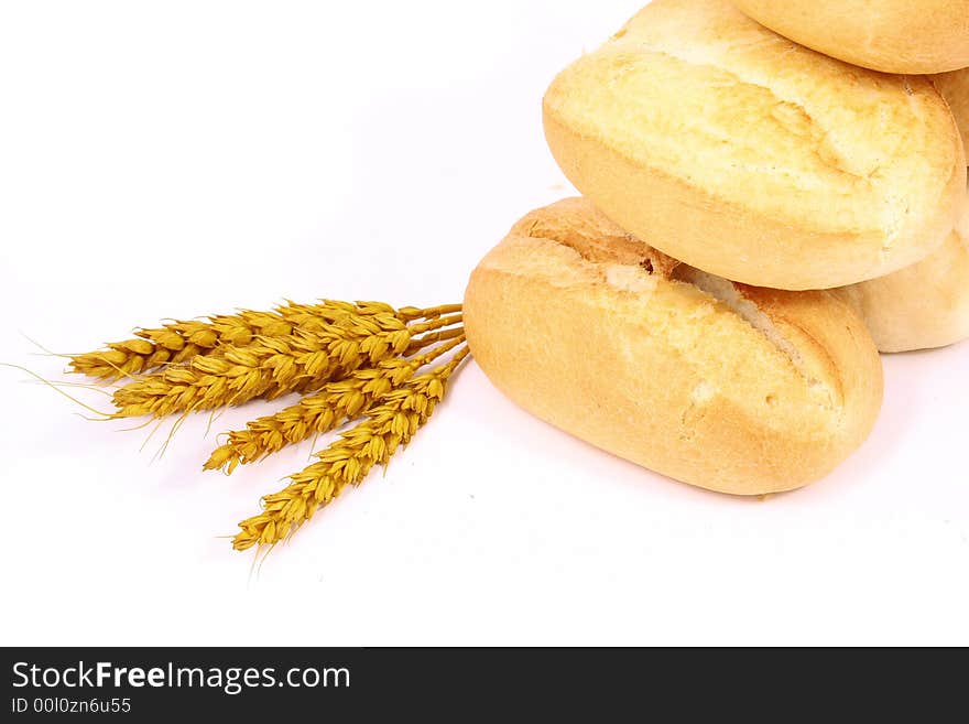 A breakfast tray with fresh bread and roll