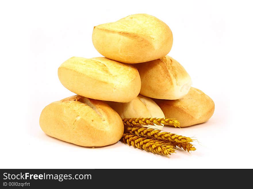 A breakfast tray with fresh bread and roll