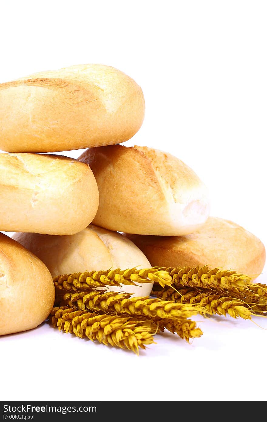 A breakfast tray with fresh bread and roll