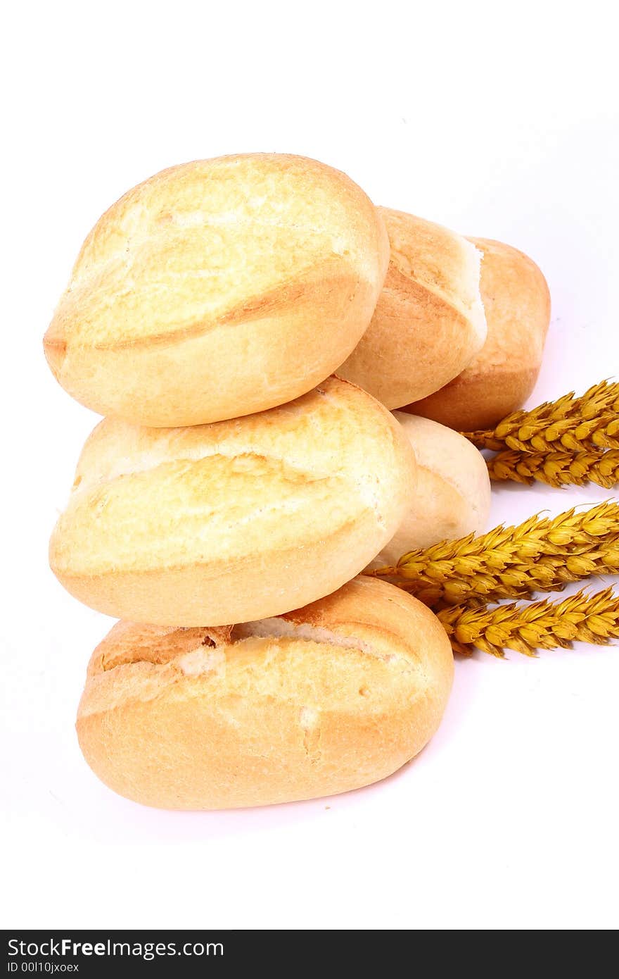 A breakfast tray with fresh bread and roll