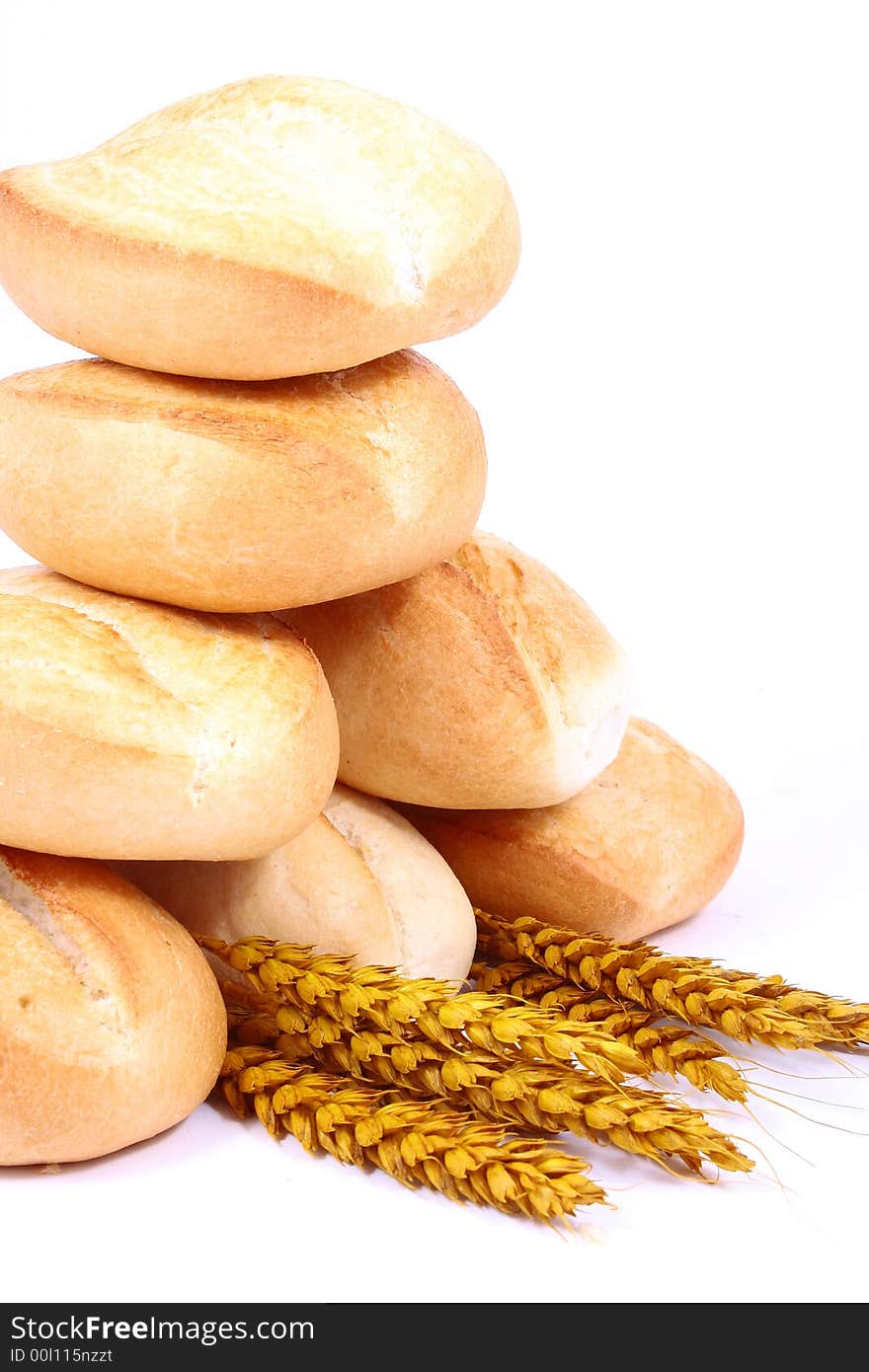 A breakfast tray with fresh bread and roll