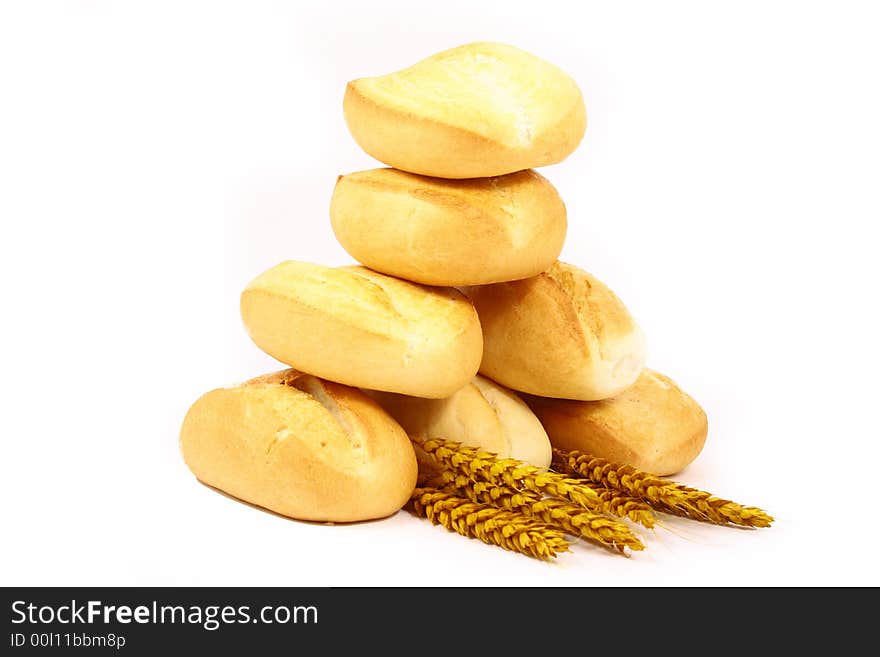 A breakfast tray with fresh bread and roll