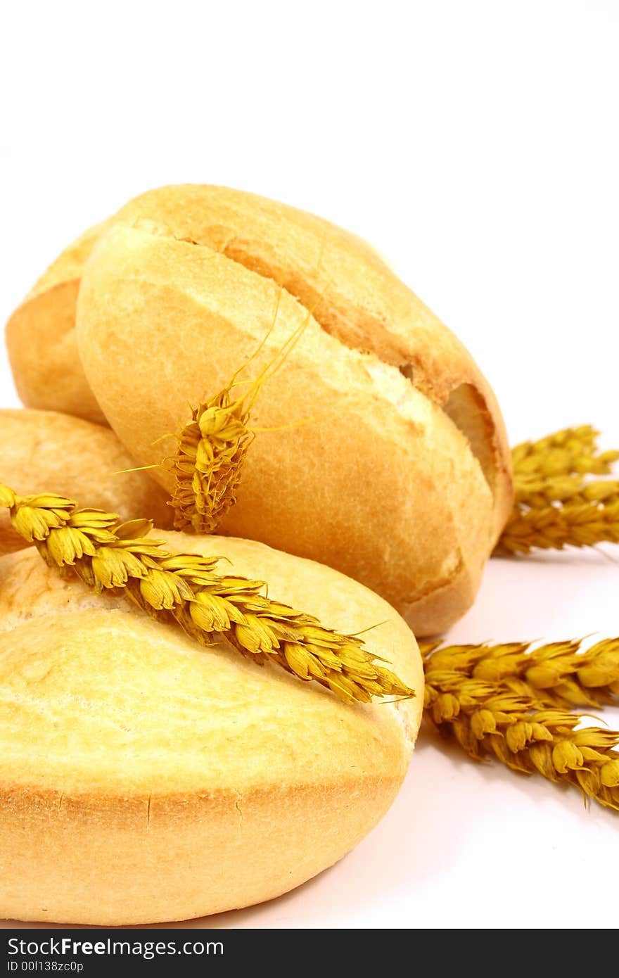 A breakfast tray with fresh bread and roll