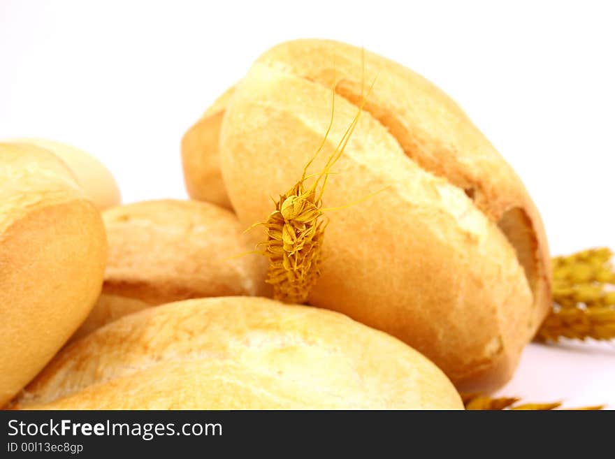 A breakfast tray with fresh bread and roll