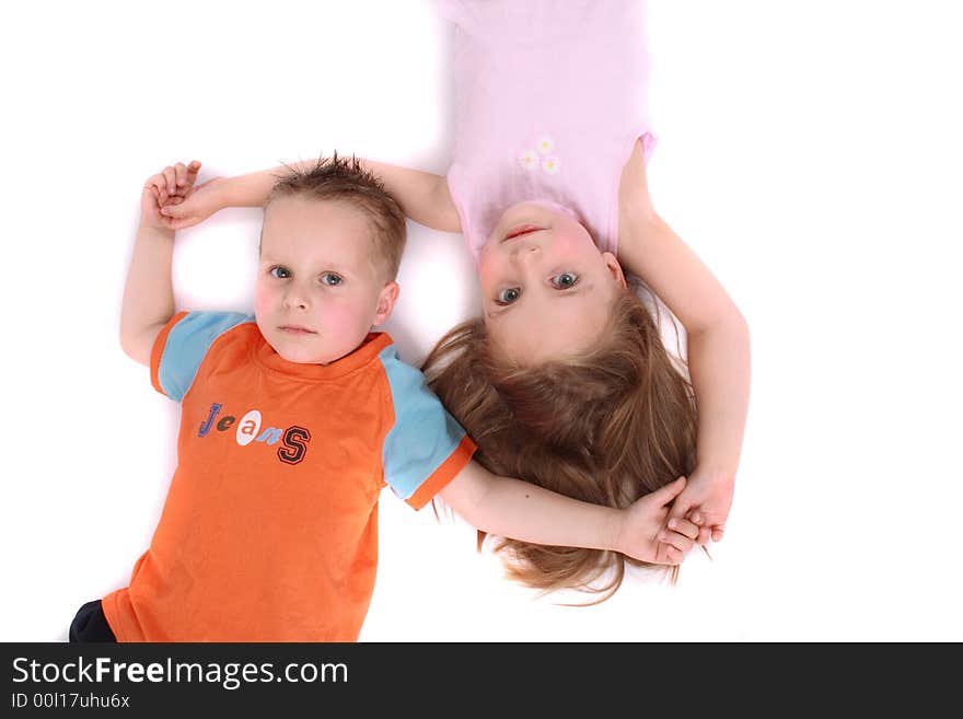 Brother and sisters (pair) on the white background. Brother and sisters (pair) on the white background