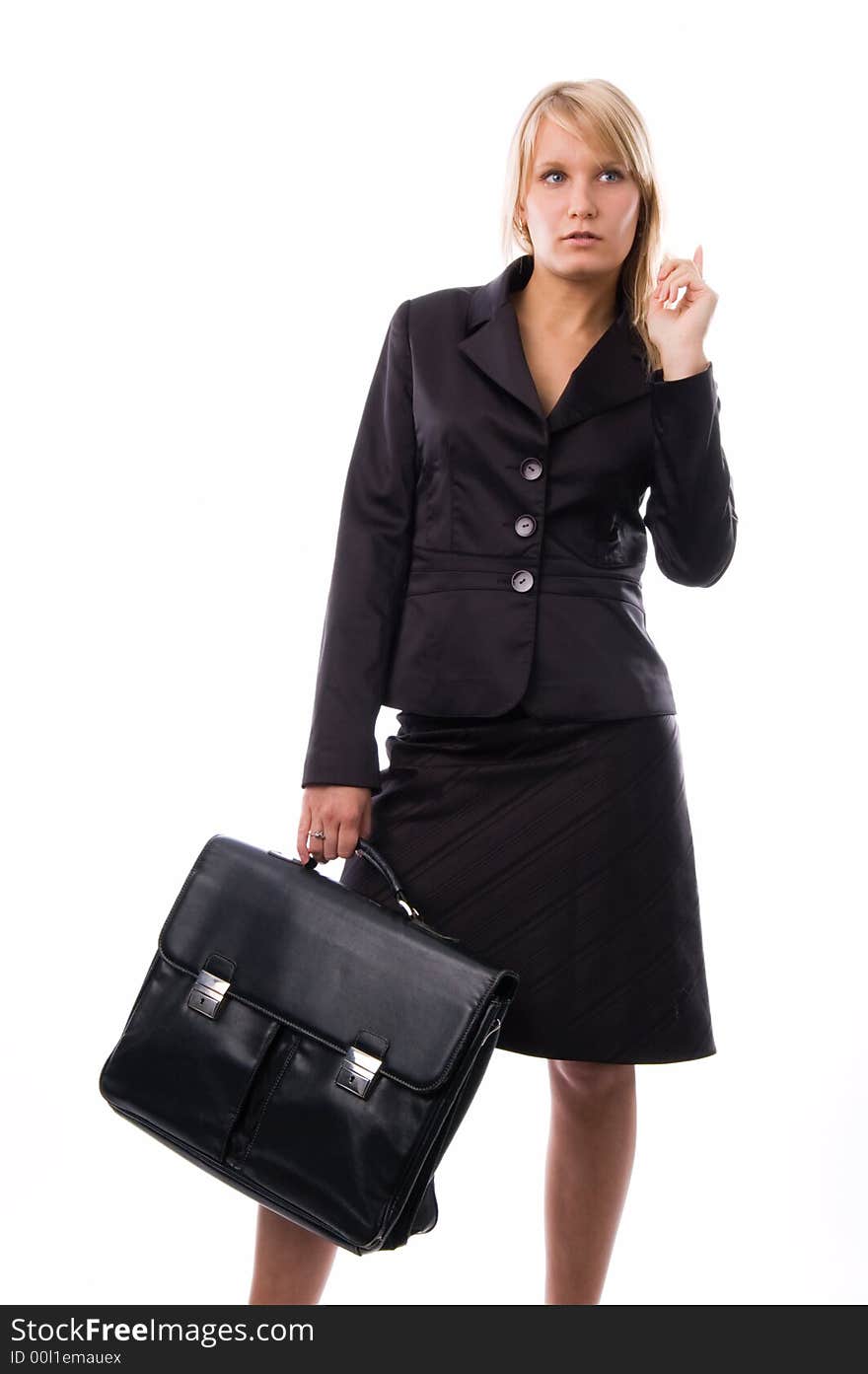 The girl in a business suit with a briefcase. The girl in a business suit with a briefcase