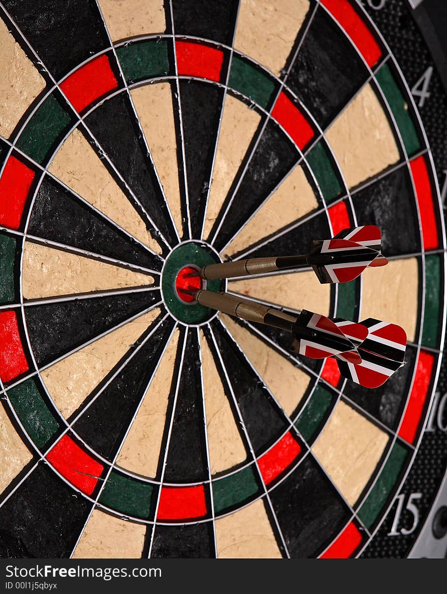 Three darts in a dartboard