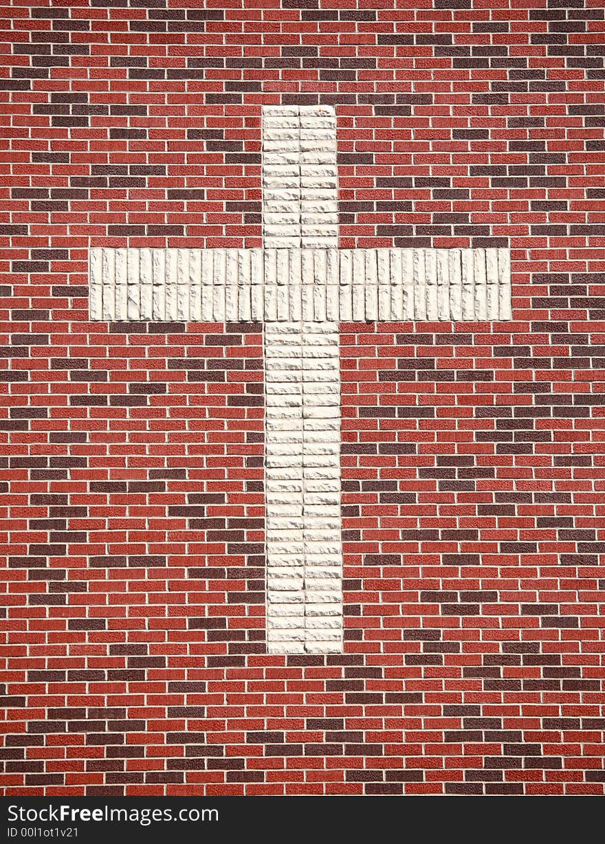 Red Brick Cross on the Side of a Church