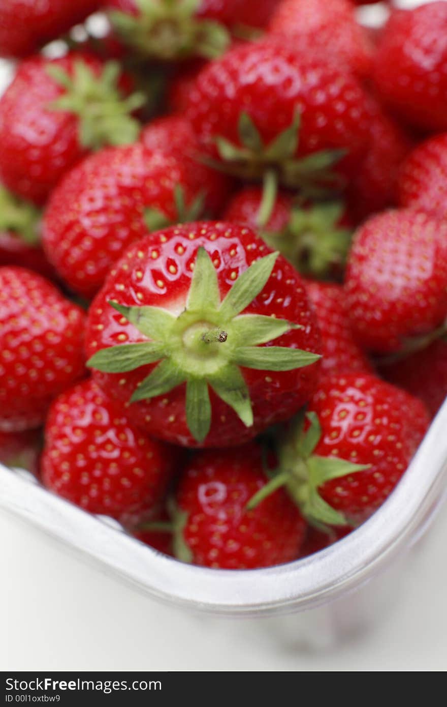 Fresh bright red Strawberries in punnet