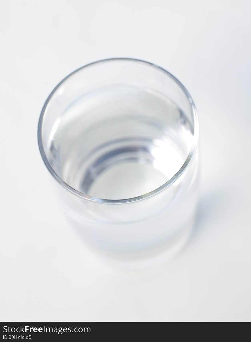 A single Glass of water against white background