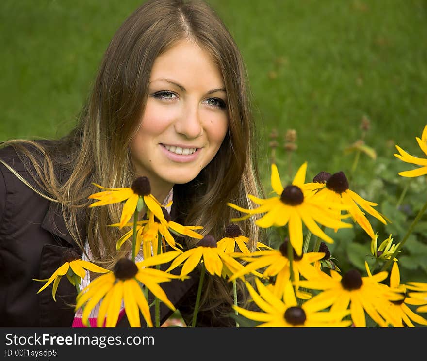 The girl  among yellow colors