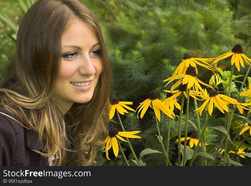 The girl  among yellow colors