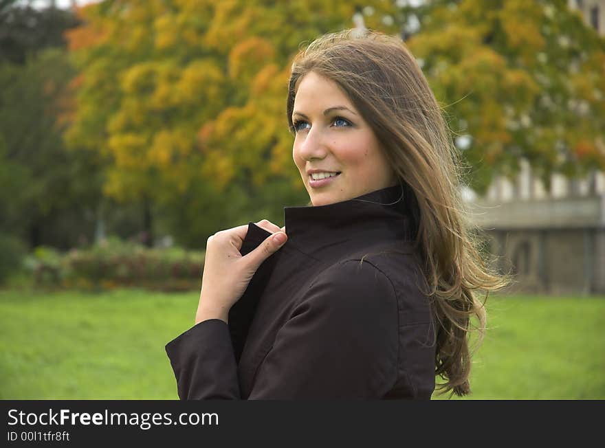 Portrait of the beautiful girl in autumn park. Portrait of the beautiful girl in autumn park