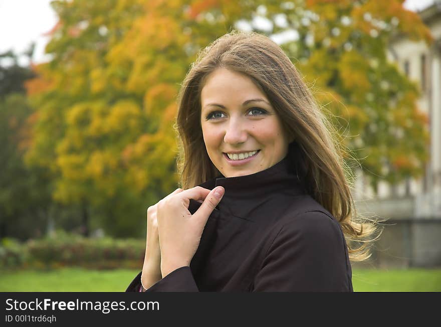 Portrait of the beautiful girl in autumn park. Portrait of the beautiful girl in autumn park