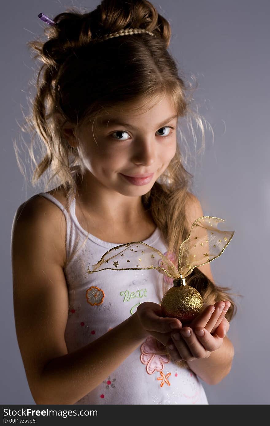 The girl touches a gentle flower. The girl touches a gentle flower