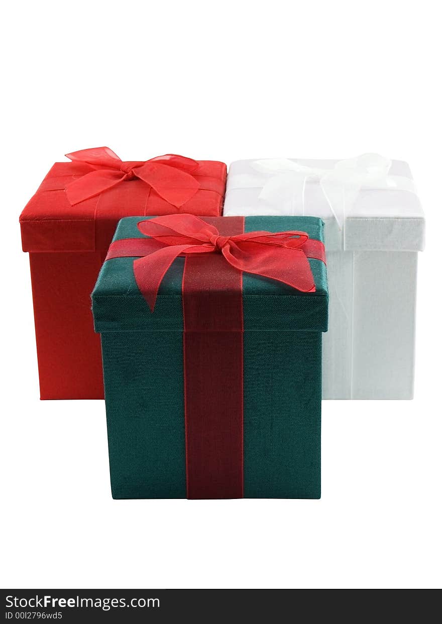 Three Christmas presents isolated on a white background