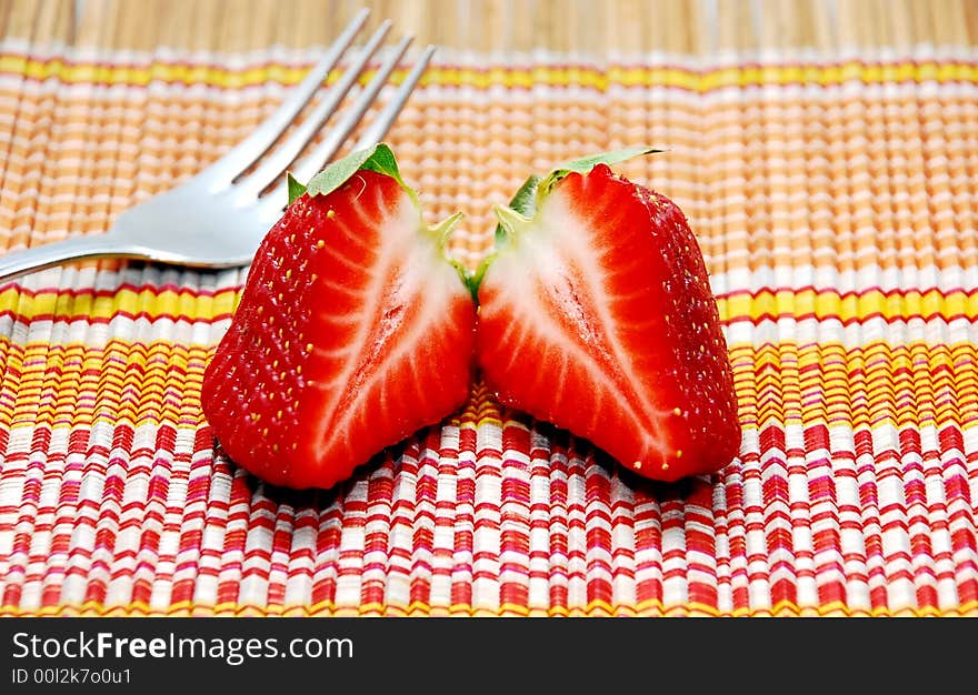 Beautiful focus a strawberry image on the wooden table